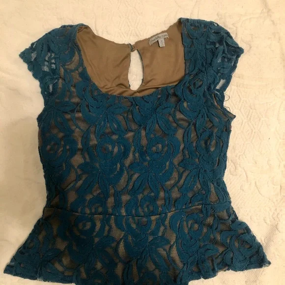 Elegant Charlotte Russe top tagged as medium fits like a small size 4. - Picture 5 of 5